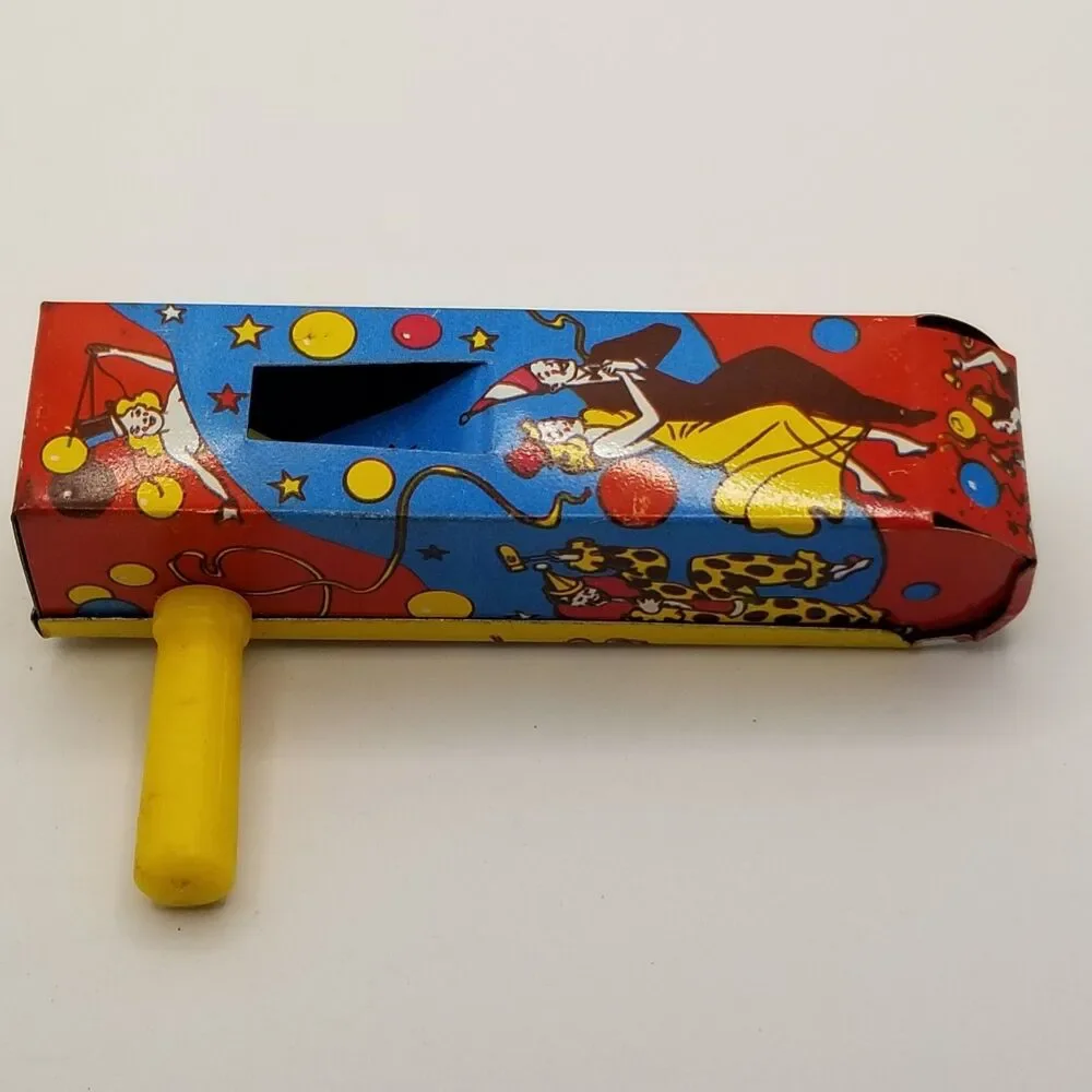 vintage tin lithograph ratchet style US Metal Toy Co noisemaker party theme